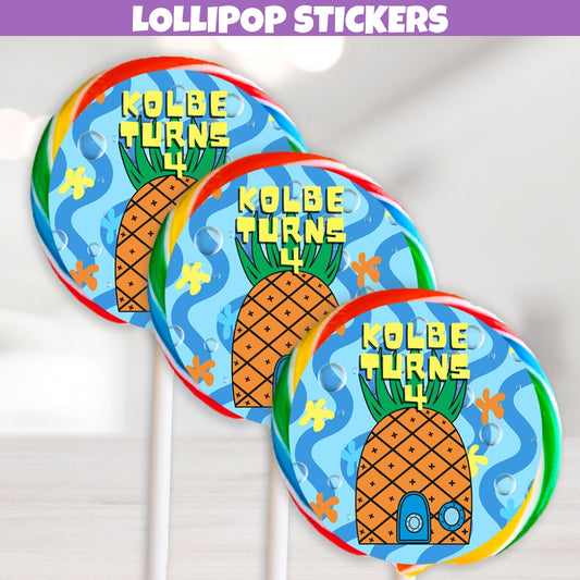 Fun personalized blue yellow and orange tropical birthday lollipop label stickers for decorations and party favors designed with a popular underwater pineapple house cartoon