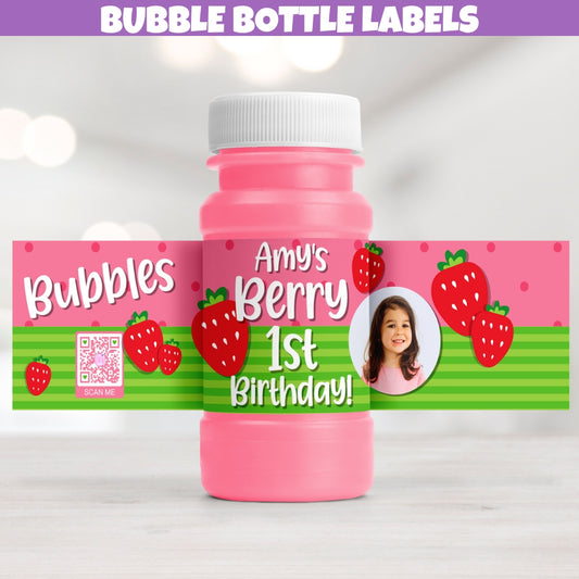 personalized strawberry birthday bubble bottle labels designed with adorable berries, pink polka dots, and green stripes. labels are customized to feature your own photo, name, and age.